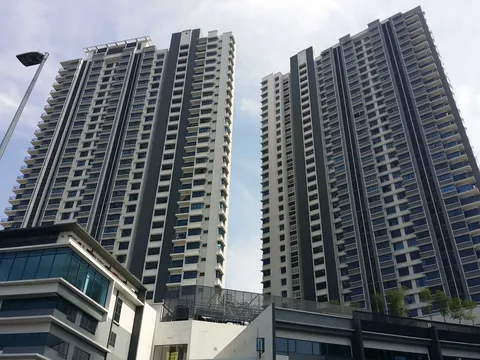 The Link 2: The facades of two tall residential towers with light and dark vertical stripes, viewed from a low angle.